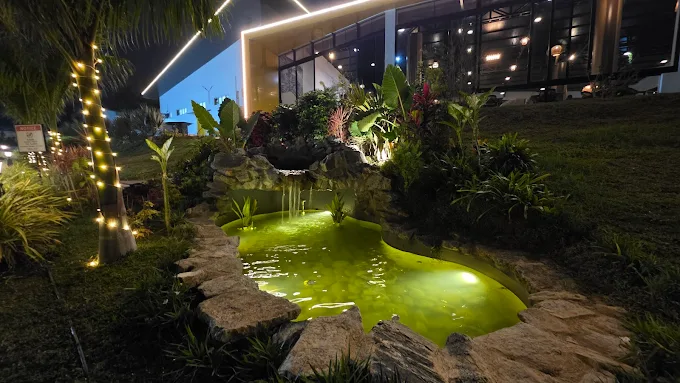 Family enjoying nature retreat and swimming pool at Poppys Tuskers Hill Resort Anaikatti