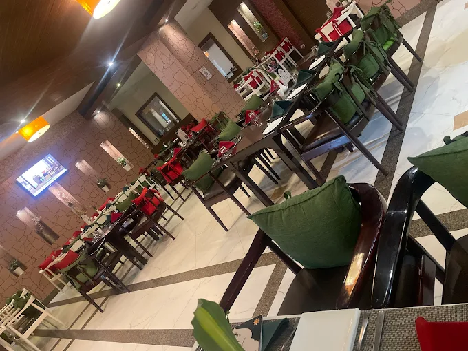 Elegant dining ambience at Melting Pot Restaurant inside Poppys Hotel Madurai