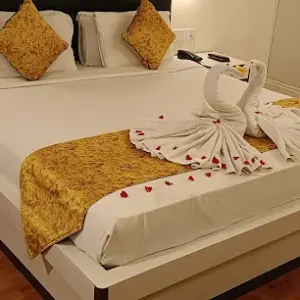 Comfortable hotel room with modern amenities in Kodaikanal