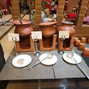 Buffet breakfast spread with attentive service at Melting Pot Restaurant Madurai