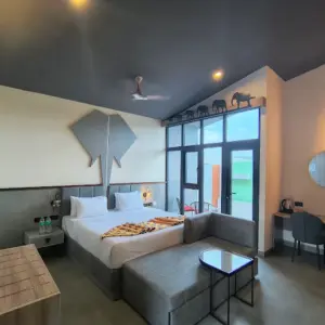 Luxury resort rooms and landscaped surroundings at Poppys Tuskers Hill Resort Anaikatti