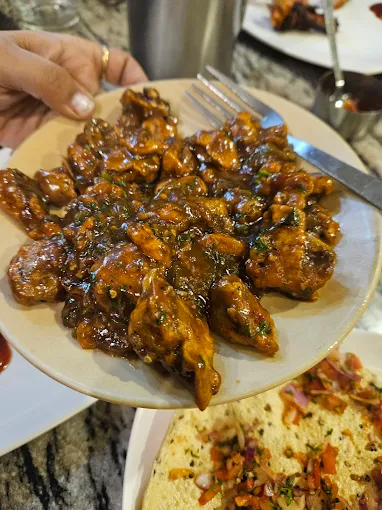 Elegant dining setup at Melting Pot Restaurant Ooty with South Indian breakfast