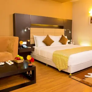 Spacious and clean rooms at Poppys Hotel Madurai with comfortable beds