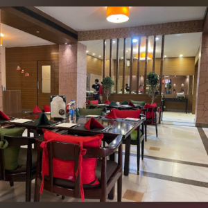 Guests enjoying a warm dining experience at Melting Pot Restaurant in Madurai