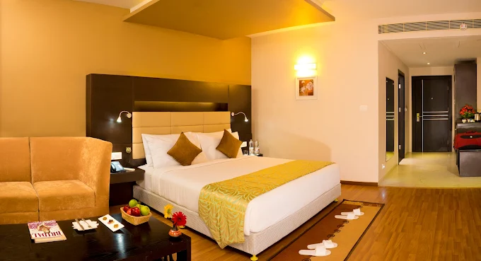 Premium luxury hotel room and guest services at Poppys Hotel Madurai