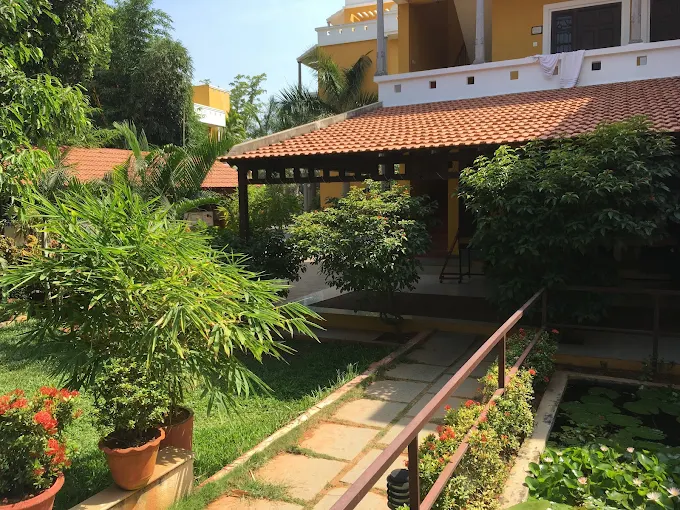 Garden area and deluxe rooms at Poppys Olive de’ Villa Pondicherry
