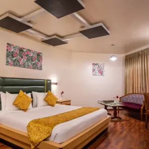 Hygienic rooms and dining experience at Poppys Pleasant Stay Kodaikanal
