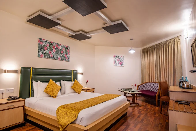Hygienic rooms and dining experience at Poppys Pleasant Stay Kodaikanal