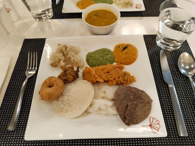 Hotel restaurant service at POPPYS Hotel Madurai