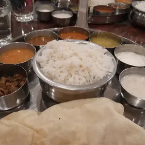 Dining area at Vinayaga by Poppys Rameswaram offering buffet and à la carte options