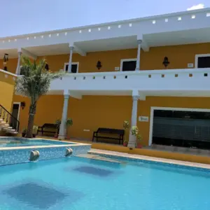Guests enjoying swimming pool at Poppys Olive de’ Villa Pondicherry