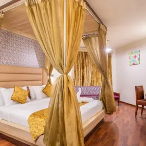 Clean and cozy hotel room at Poppys Pleasant Stay Kodaikanal