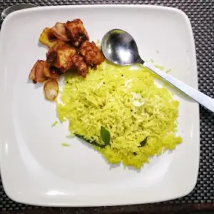 Premium triple room interior at Vinayaga by Poppys Rameswaram