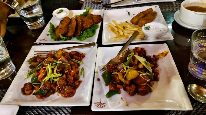 Guest dining experience at Melting Pot restaurant in Poppys Hotel Madurai