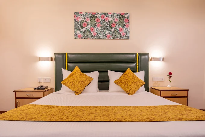 Spacious and well-maintained hotel room at Poppys Pleasant Stay Kodaikanal