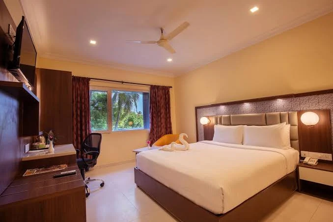 Clean hotel room near railway station at Vinayaga by Poppys Kumbakonam