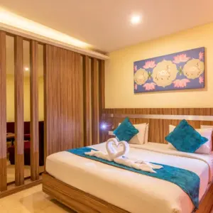 Family-friendly hotel room and amenities at Vinayaga Inn by Poppys Ooty